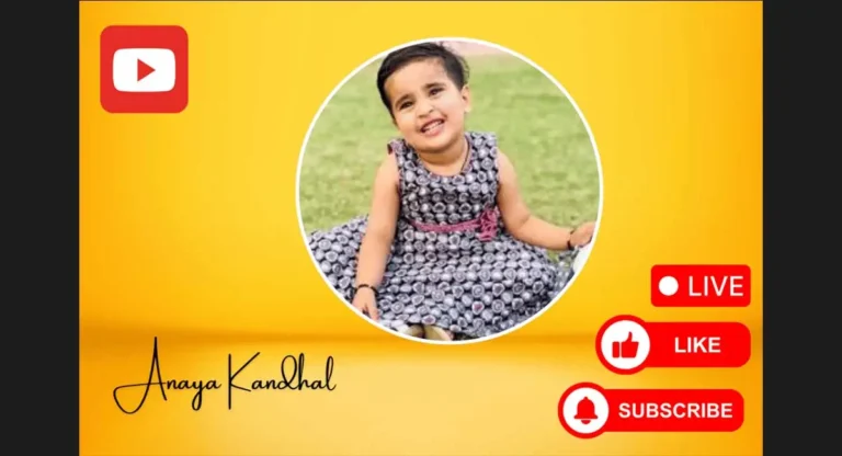 a small indian girl sitting in ground