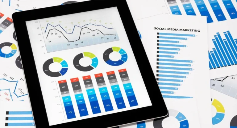 charts and reports docs on table with tablet